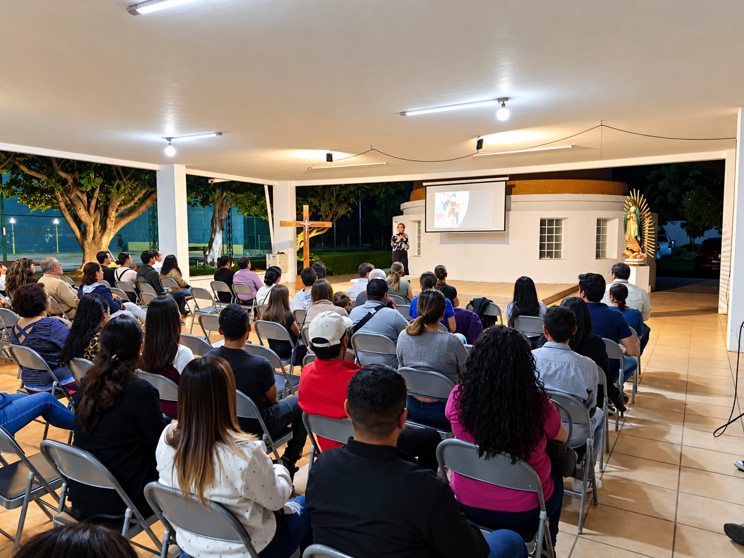 Conferencia nocturna con proyección